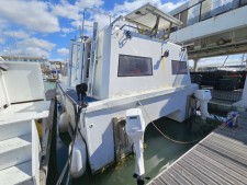 Converted Catamaran Workboat Style Liveaboard